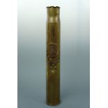 A Great War shell case trench art vase bearing the arms of Verdun, 38 cm