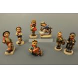 Seven Hummel figurines including "Barnyard Hero", "School Boy" etc, tallest 11 cm (free of damage)