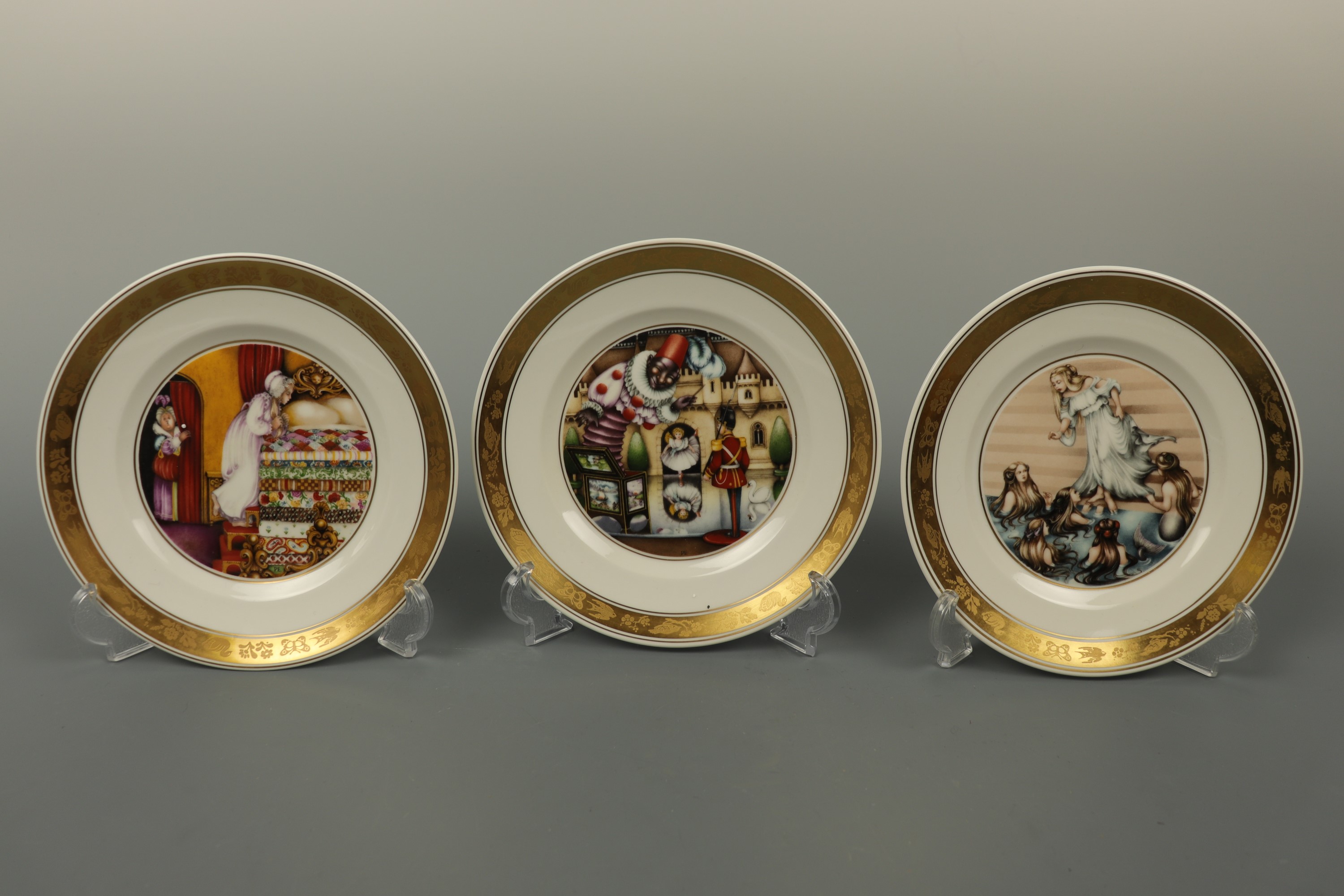 Twelve Royal Copenhagen "The Hans Christian Andersen plates" boxed 19 cm
