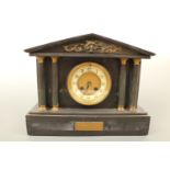 A Victorian polished slate and marble mantle clock with presentation plaque, (replacement quartz