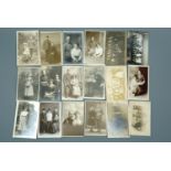 Approximately 40 Great War photographic portrait and similar postcards