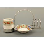 An early 20th Century Royal Doulton toast, butter and preserve set and electroplate stand, H3471, (