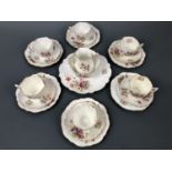 A Victoria tea set for six, comprising six tea cups, saucers and cake plates, together with a