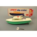 A Sutcliffe Toy clockwork "Sprite Day Cruiser" tinplate boat, in original carton