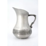 An Italian pewter baluster jug by Veralucino, decorated with a relief Greek key band, late 20th