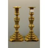 A pair of Victorian brass candlesticks, 20 cm high
