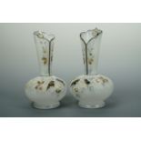 A pair of Victorian frosted glass and enamelled vases, 23 cm high (free of damage)