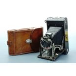 A Kodak Six-20 folding camera with No. 0 lens and Kodon shutter, in leather case