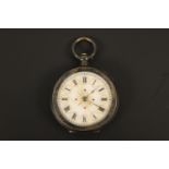 A Victorian lady's white-metal cased fob watch, having an enamelled face and Roman numerals, cased