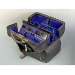 A Victorian hide fitted travelling case / Gladstone bag