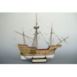 A wooden scale model 15th Century Merchant Ship, 1:72 scale, 42 cm long