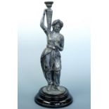An early 20th Century spelter figural table lamp base, modelled as a woman in Moorish costume, on
