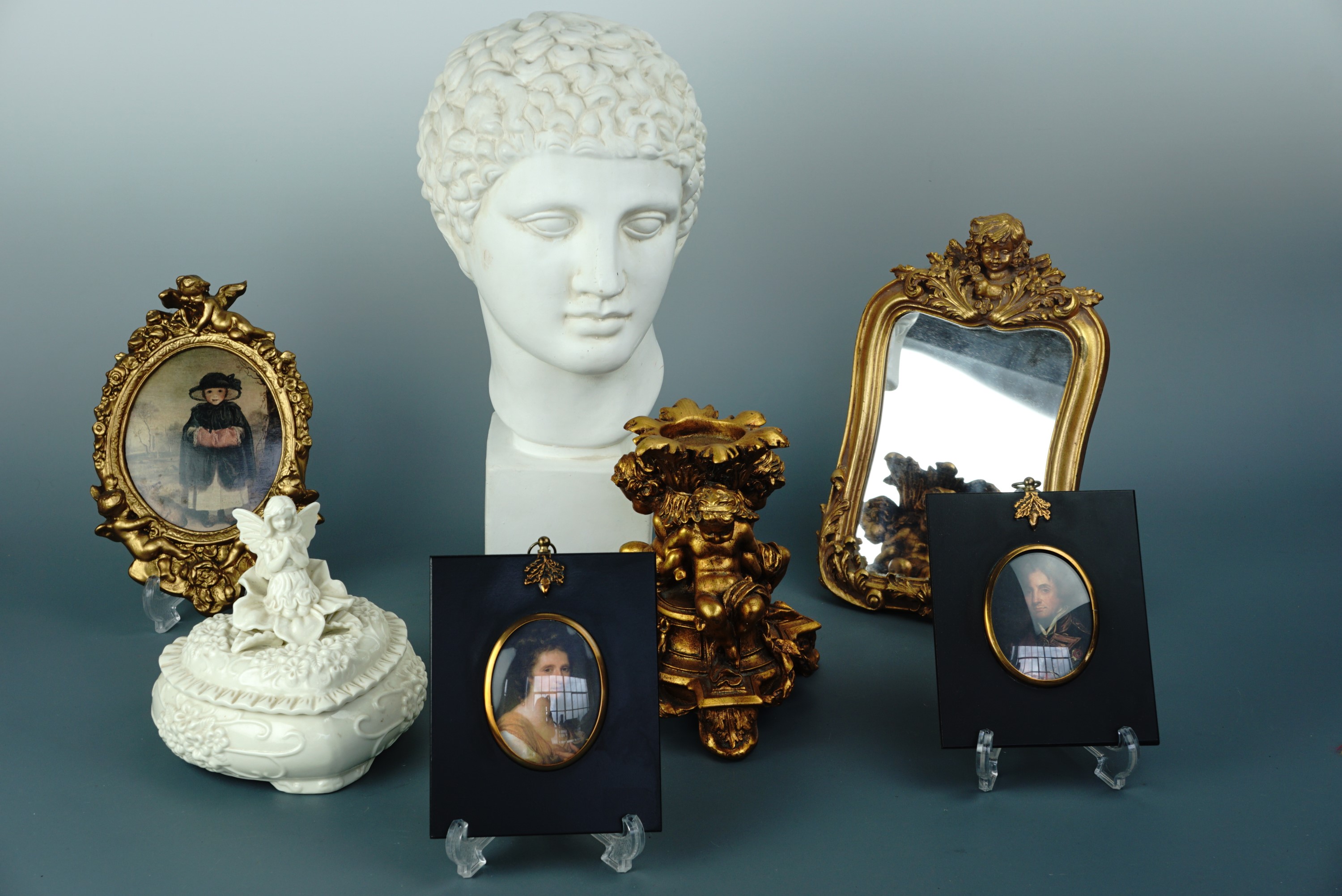 Contemporary decorative furnishing items including a reproduction classical bust, portrait