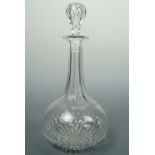 A cut glass shaft and globe decanter with ground-in stopper