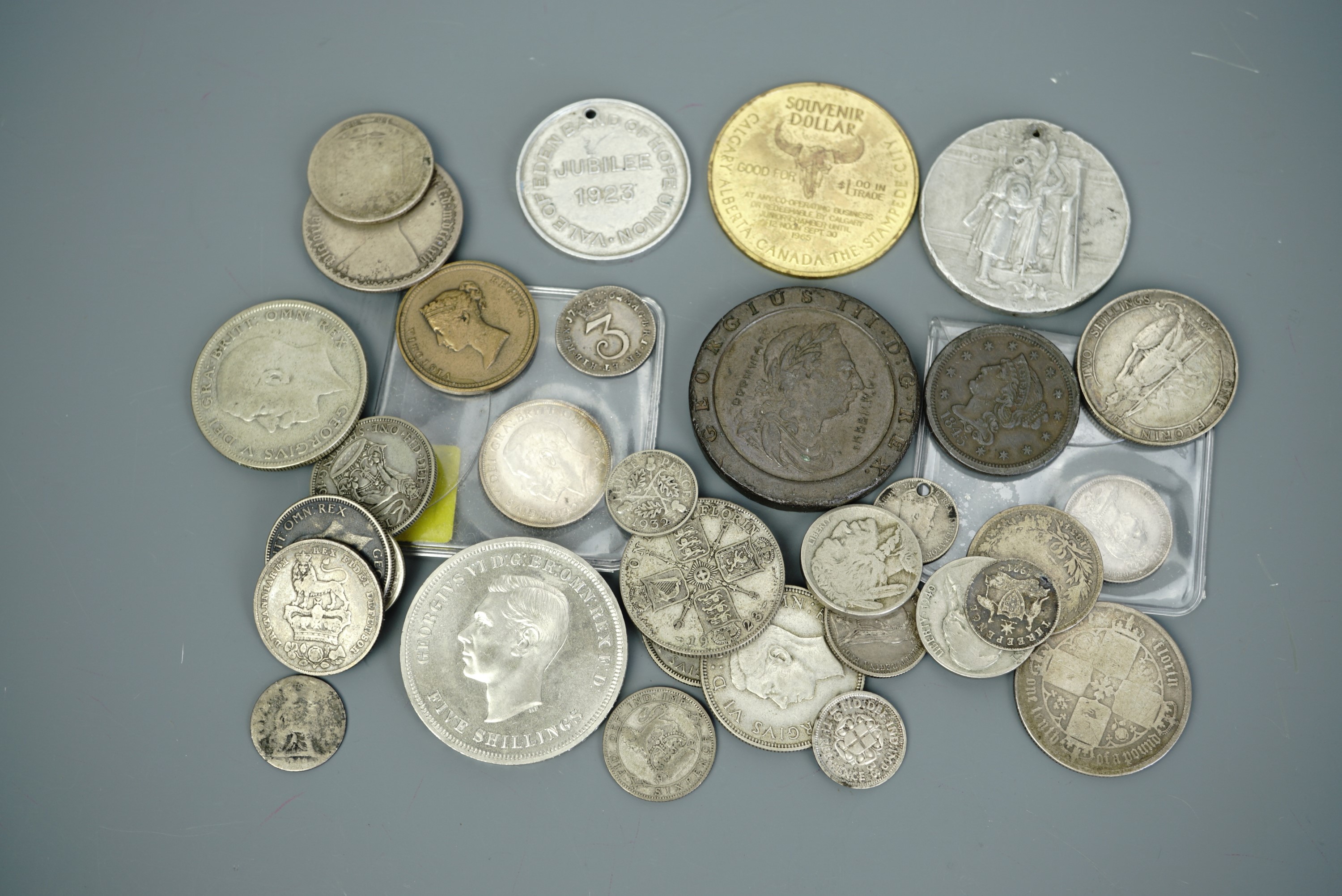 Sundry largely GB coins, tokens and medallions including an over-struck "cartwheel" 1d, Georgian and