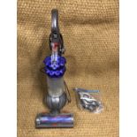 A Dyson DC50 Animal upright vacuum cleaner, and accessories