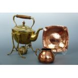 An early 20 th century brass spirit kettle and stand by J Soutter and Sons, together with a copper