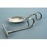 A 1940s silver child's spoon and pusher