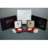 Two Royal Mint year sets, a Millennium £2 coin and two 1977 silver proof crowns