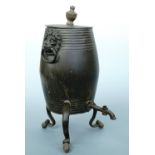 A 19th Century bronzed pewter urn, with lion mask loop handles, turned wooden finial and feet, 32