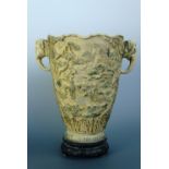A 1960s kitsch faux ivory vase on stand, moulded resin, 30 cm