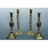 A pair of Victorian "Diamond Princess" brass push-eject candlesticks together with a pair of