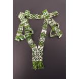 A vintage Native American beadwork necklace, worked in green and white, second quarter 20th Century