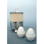 An electroplate and composition caddy together with composition oviform salt and pepper pots, c.