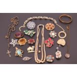 A quantity of vintage costume jewellery, including mid 20th Century paste brooches, a hinged bangle,