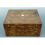 A Victorian marquetry and string inlaid walnut writing box, in a geometric design, lacking inner