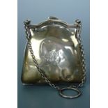 An early 20th Century silver ring purse, 8 cm x 8 cm, 69 g