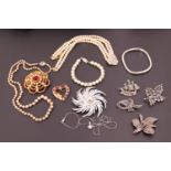 Costume jewellery including two statement brooches, a Lotus faux-pearl necklace with white metal