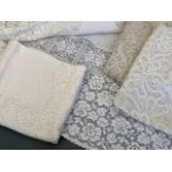 Late Victorian Gothic-influenced lace tea table cloths, together with one further similar woven lace