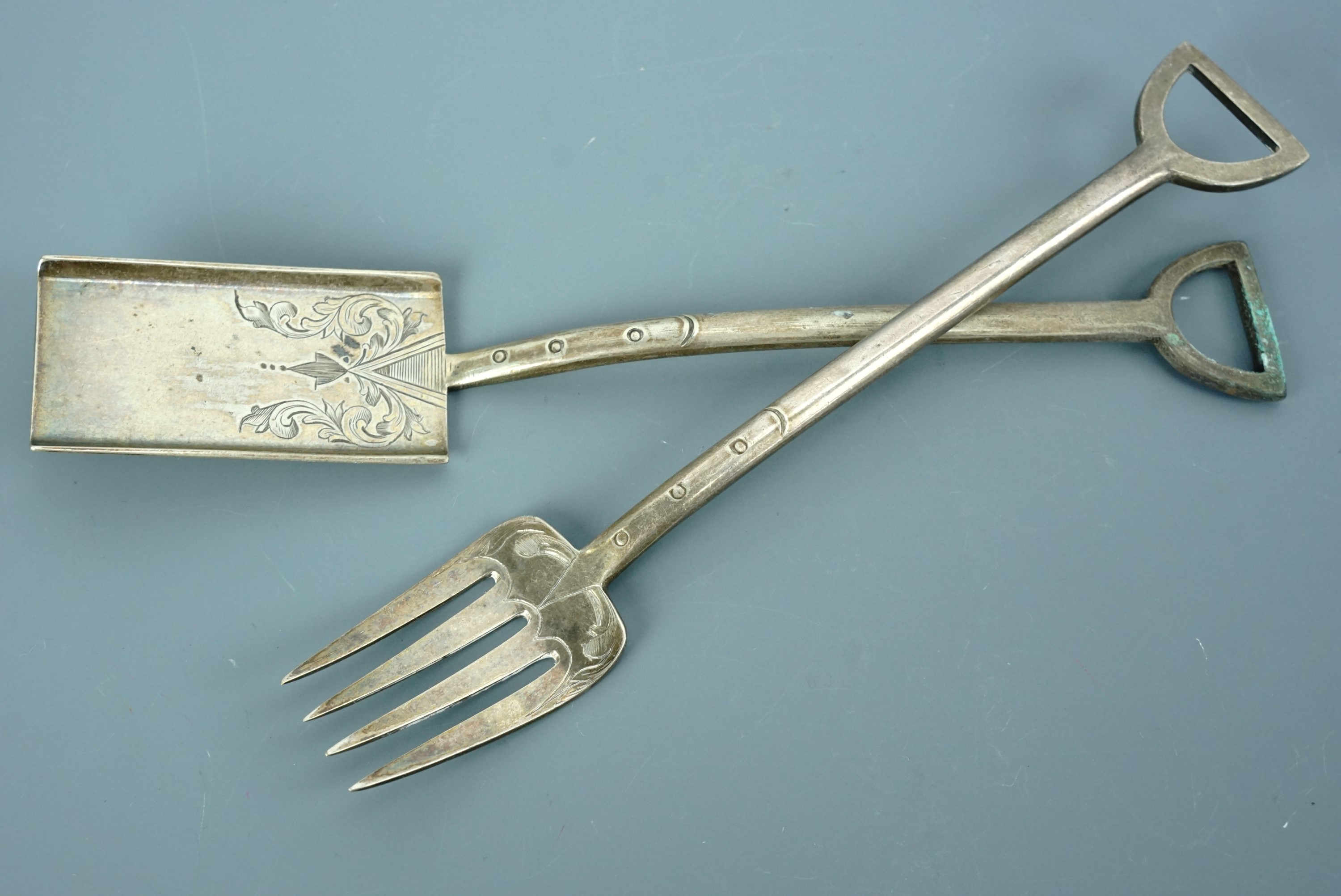 A Victorian electroplate novelty pickle fork and preserve spoon modelled as a garden fork and spade