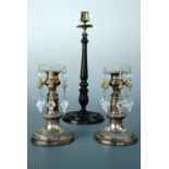 A pair of Victorian electroplate telescopic candlesticks together with a Georgian style turned and