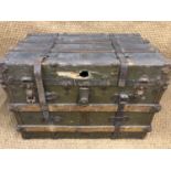 A late 19 th Century olive drab canvas bound and gilt steel mounted cabin trunk by Headley and