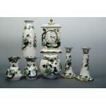 Seven items of Mason's Chartreuse ware including a pair of candle sticks, 17cm, a pair of vases, a
