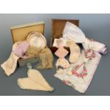 A collection of antique and vintage hand-sewn tokens of endearment and sundry treasured textiles,