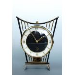 A 1950s - 1960s "Patria" brass mantle clock, 21 cm high