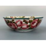 A Wemyss Ware wash bowl or basin, decorated with pink cabbage roses to the interior and exterior, 40