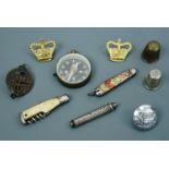 Collectors' items including a NAAFI lapel badge, a Queen Elizabeth II Coronation folding knife, a