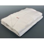 Antique and vintage bed linens, including Victorian slip cases with pen and ink and embroidered