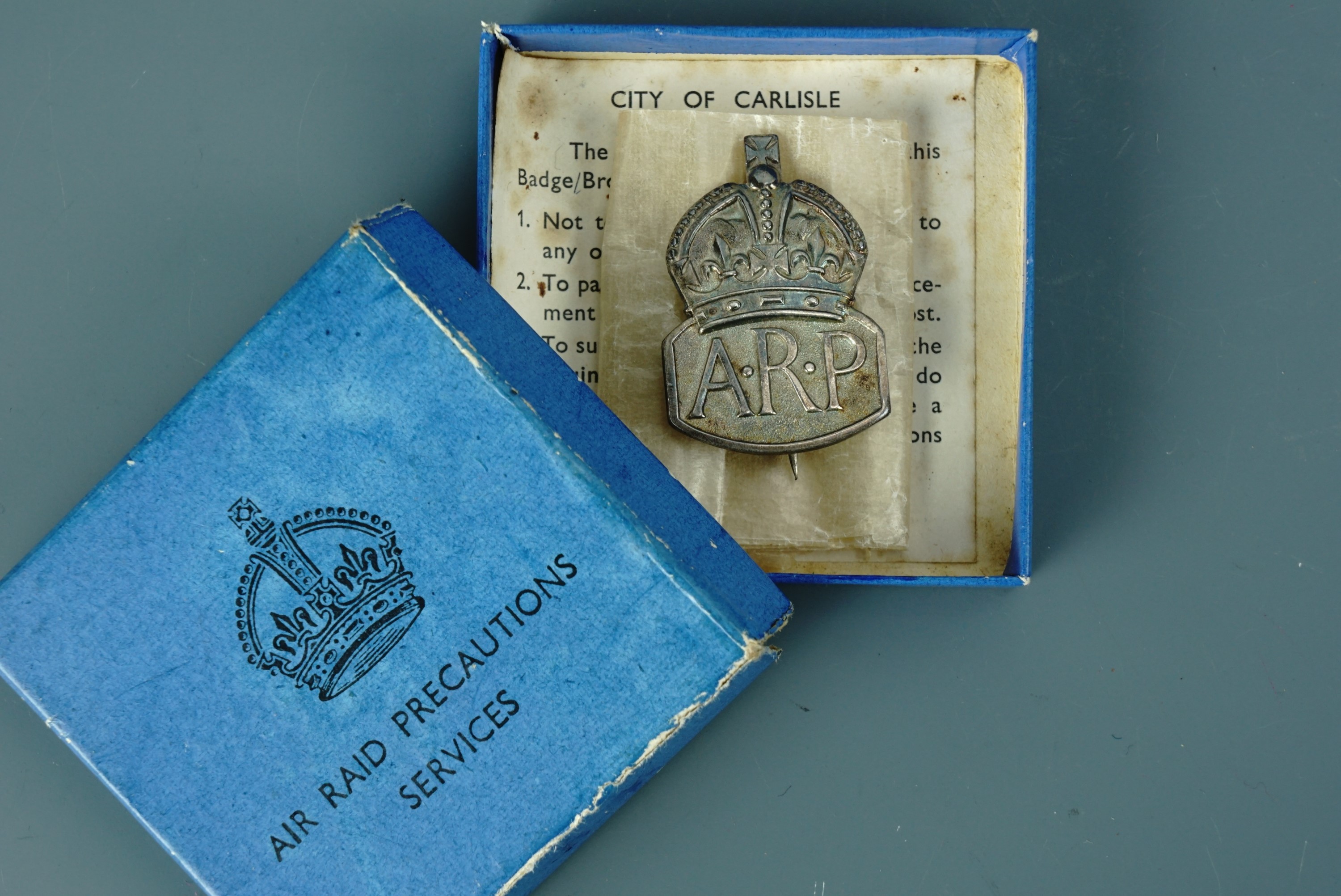 A Second World War silver ARP badge in carton with City of Carlisle ARP Department printed - Image 2 of 2