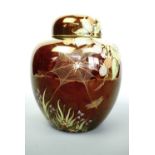 A Carlton Ware Rouge Royale jar and cover in the Spider's Web pattern, of shouldered ovoid form,