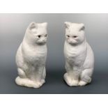 Two precast garden cats, 35 cm high (one a/f)