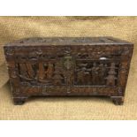 A mid-20th Century Chinese carved camphor wood chest, 89 cm x 85 cm x 43 cm high