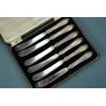 A cased set of six George V silver handled butter knives, Sheffield, 1921, 172 g