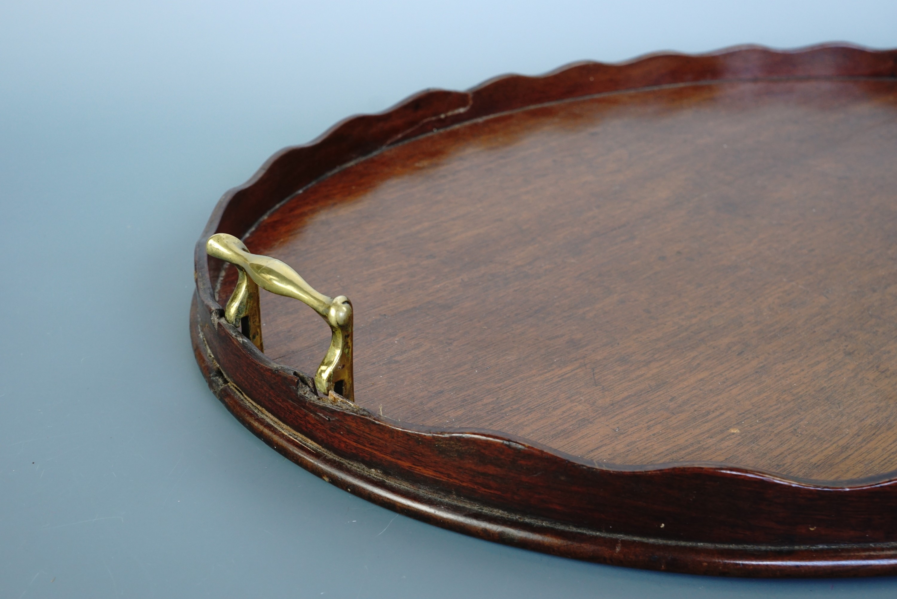 An Edwardian mahogany tea tray with volute brass handles, 60 x 45 cm - Image 2 of 2