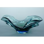 A 20th Century studio glass table centrepiece / fruit bowl, of organic rising and rippled form, in