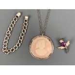 A large white metal mounted cameo pendant, a white metal and amethyst coloured thistle brooch and